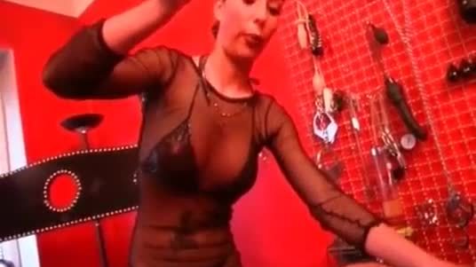 Masked slave is caught in bdsm play