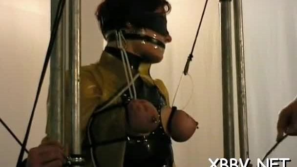 Obedient woman gets tits stimulated in harsh bdsm torment